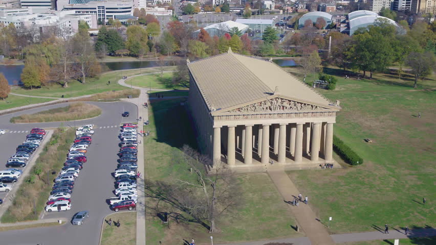 Wide aerial view of Nashville Parthenon, bright sunny day in Centennial park