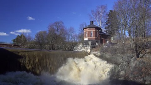 Big man-made sparkling waterfall in Helsinki in the springtime