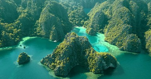 Aerial view of turquoise tropical lagoon with Karst limestone cliffs in Coron Island, Palawan, Philippines. UNESCO World Heritage Tentative List.