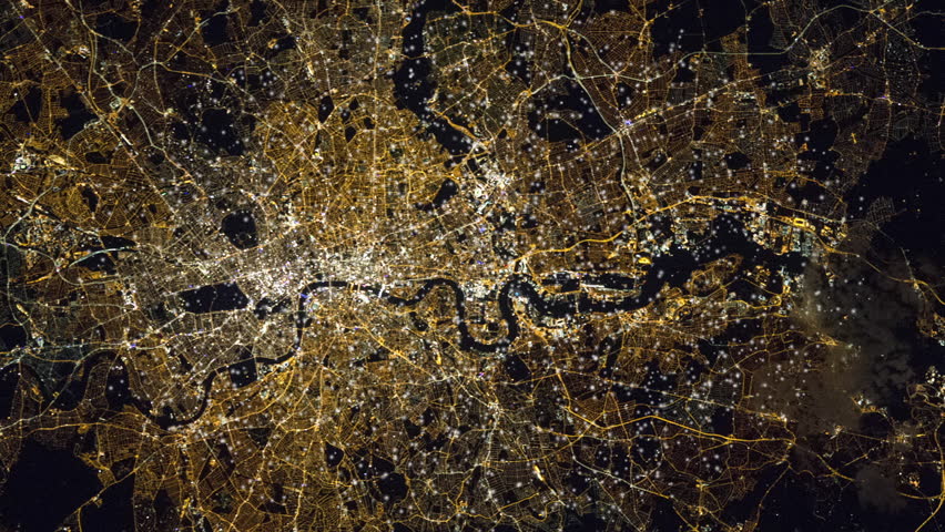 London city satellite view by night with animated flashing lights. Contains public domain image by Nasa
