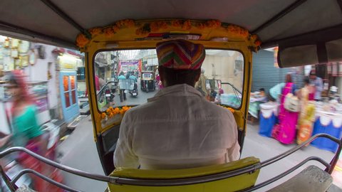 Autorickshaw POV busy illuminated old city streets, Udaipur, Rajasthan, India - 4K timelapse