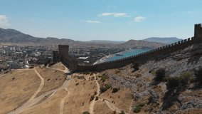 4K Aerial Drone Footage of the Genoese Fortress Wall and Revealing the Coastal City of Sudak on the Black Sea