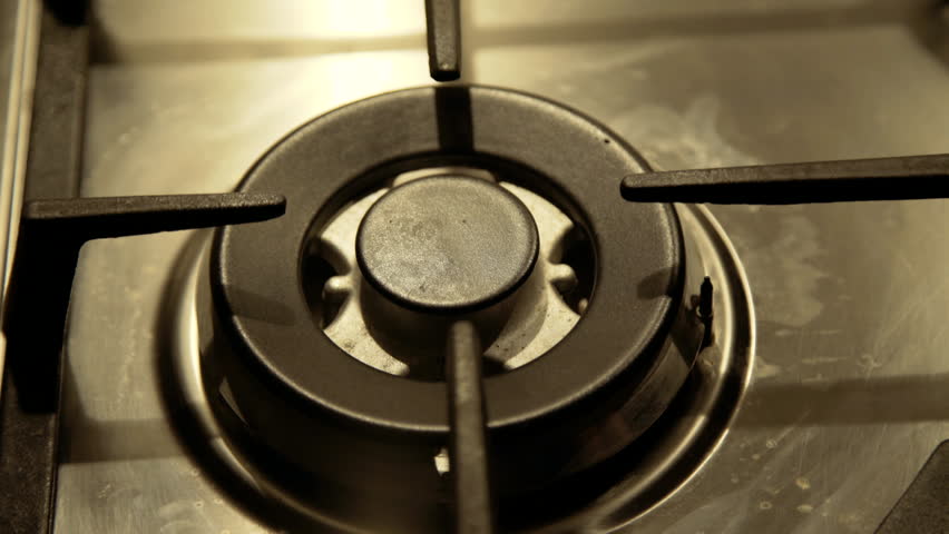 Background of electric hotplate on stove top. Fast igniting and turning off. Close view. 4K