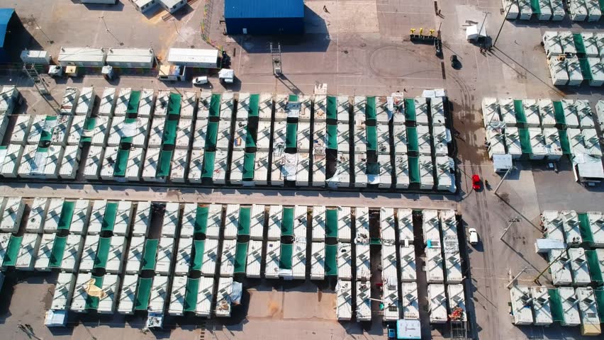 Aerial view of refugee camp in Athens Greece where refugees are living in shipping containers. Royalty-Free Stock Footage #1027138670