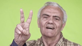 Senior Elderly Happy Man holding a smartphone , Close up Slow Motion Video
