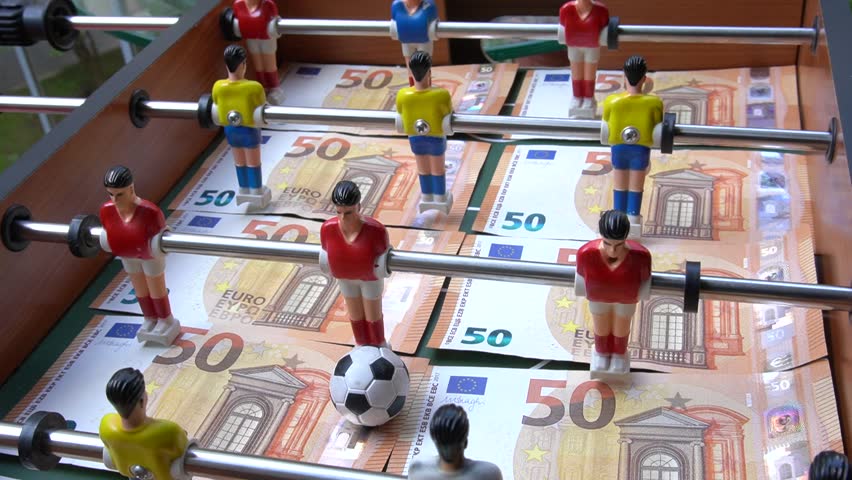 Table soccer football game - sports betting in the world of football - pleyers and euro money Royalty-Free Stock Footage #1027152377
