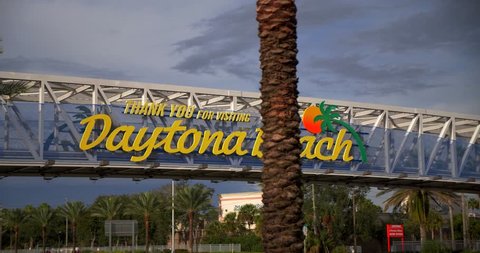 Daytona, Florida / United States - November 28 2018: Welcome to Daytona Beach Sign, Florida Highway Slow Motion