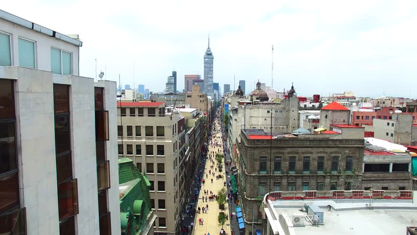 Drone flying over Madero street in the historic center of Mexico City. Latin American Tower