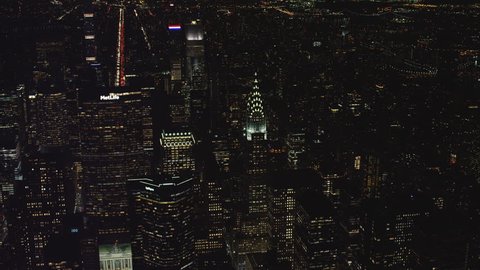 New York, NY CIRCA 2018. Aerial view of the Chrysler Building in downtown manhattan, New York City, at night during the winter. 4k aerial footage.