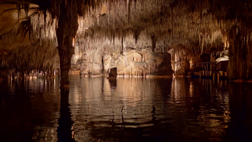 Cuevas del Drach on Majorca Island, Spain. Stabilized shot of lake in dragon cave from boat Royalty-Free Stock Footage #1027166465