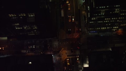 Top down aerial view of the streets of downtown Manhattan, New York City, at night during winter. Shot on 4k RED camera.