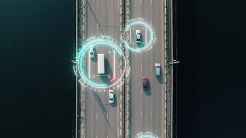 4k aerial view of driverless or autonomous car. Traffic passing by a highway. Plate number, speed limit and ID number displaying. Future transportation. Artificial intelligence. Self driving.