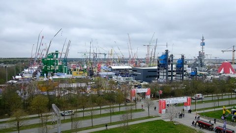 munich, germany, 08 april 2019, bauma, world's biggest exhibition for construction equipment, view from selfie tower, slow motion video
