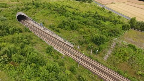 Tunnel entrance of high speed train track - aerial view, drone footage