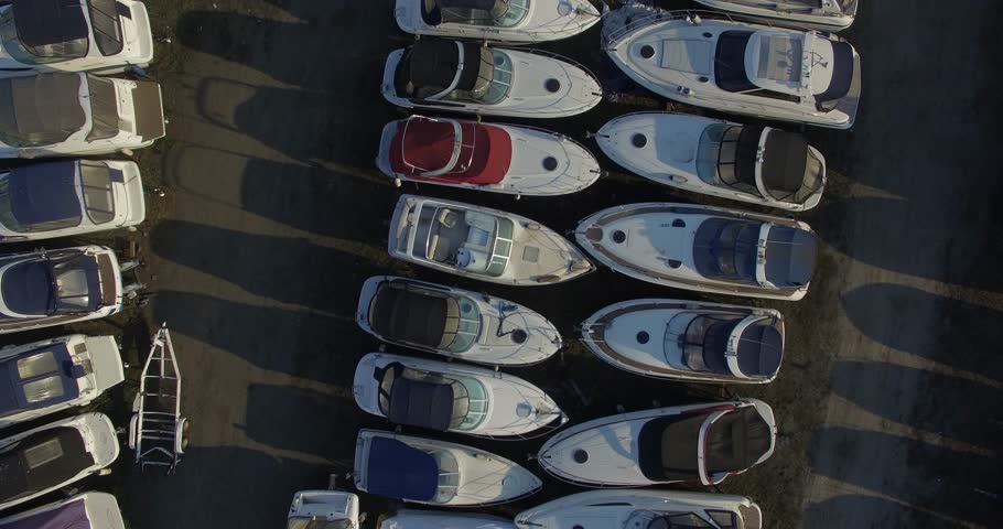 Many beautiful yachts are on the river