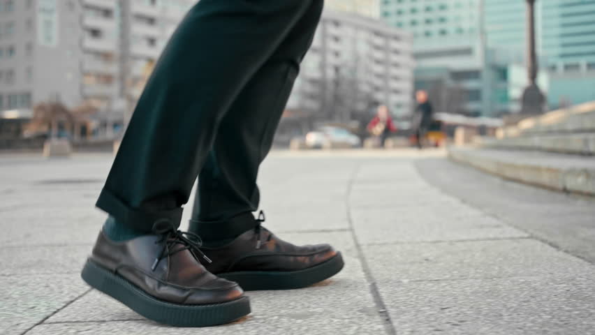 Close Up 4K Slow Motion Shot of Office Worker Man Walking Upstairs Outdoors in City. Male Feet in Suit and Platform Shoes Making Steps to Climb Up the Stairs Royalty-Free Stock Footage #1027225115