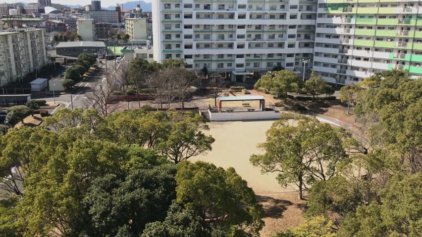 Playground and picnic facilities at Honjo park, a public park spanning the suburbs of Chiyogasaki in inner urban Kitakyushu, Japan