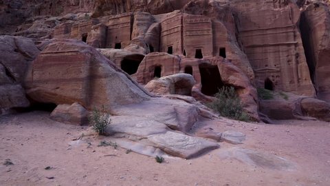 A Rotating Shot of Ancient Nabatean House Facade Carved Out of the Sandrock in Ancient City of Petra