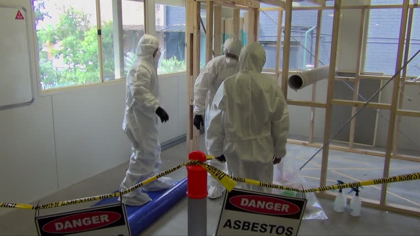 Asbestos safety using appropriate person protection  Royalty-Free Stock Footage #1027237976