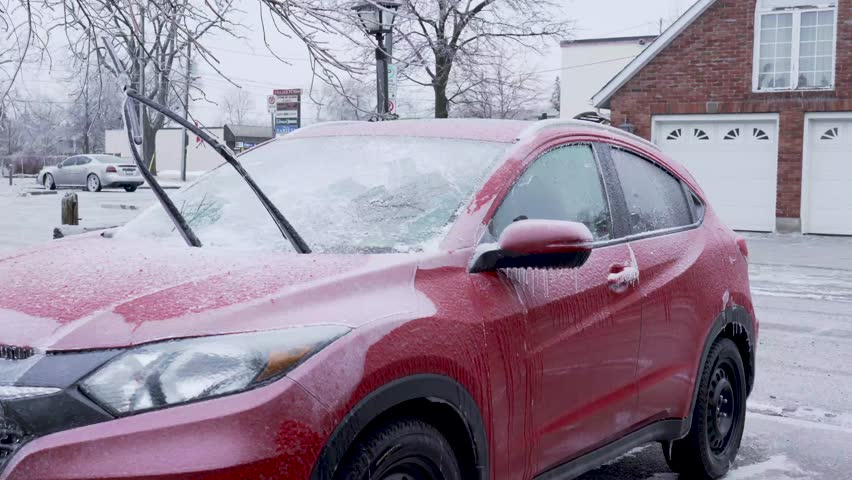 Scraping Ice from car