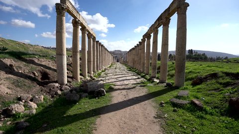 A Long Straight Stone Path of Well Preserved Corinthian Pillars in Roman Ruins in Jerash