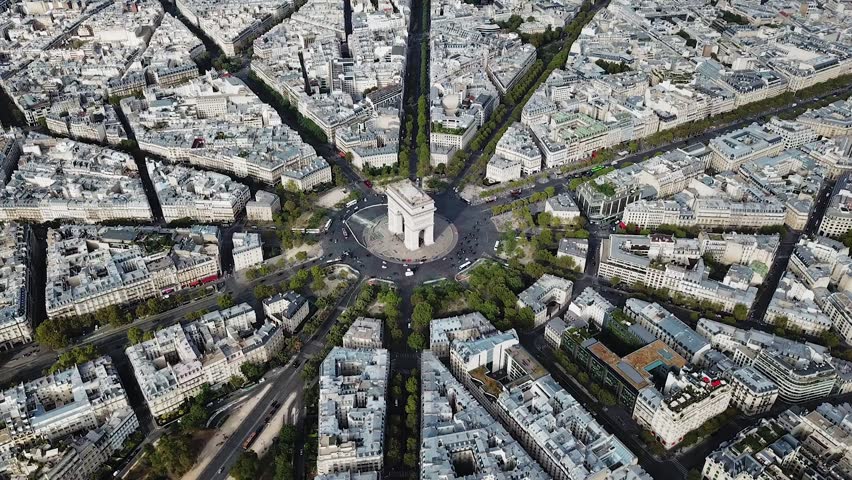 Aerial, orbit, drone shot, of traffic around Arc de Triomphe, on Place Charles De Gaulle, in the cityscape of Paris, on a sunny, summer day, in France Royalty-Free Stock Footage #1027258331