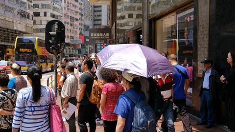 Jordan, Hong Kong -  April 10, 2019 : Street view in Jordan district. People walking across Jordan Road Kowloon, Hong Kong. 