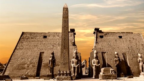 Entrance to Luxor Temple at sunset, a large Ancient Egyptian temple complex located on the east bank of the Nile River in the city today known as Luxor (ancient Thebes)