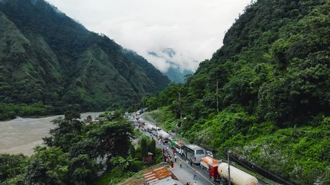 Stuck in Traffic in Beautiful Nepalese Landscape - Aerial 1