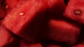 footage/ video of Watermelon or tarbooj fruit cube slices served in a bowl. selective focus
