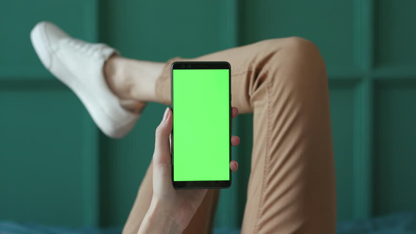 Chromakey Mock-up for Tracking or Watching Advertising Content Close-up. Casual Life of Beautiful Caucasian 20s Hipster Indoors. Point of View for Application. Scroll Up of Instagram Interface or News