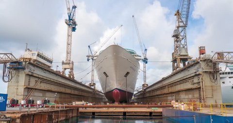 Freeport, Grand Bahama - MAR 15, 2019: Cranes in drydock renovation of Royal Caribbean cruise ship Grandeur of the Seas