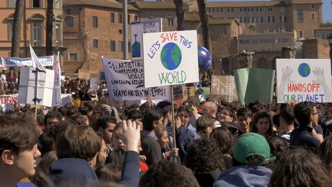 Rome,Italy,15 March 2019: Global Climate Strike: "Let's Save the World" banner
