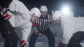 Sequence of videos of ice hockey players starting match after referee throws puck on rink, goaltender catching it at net