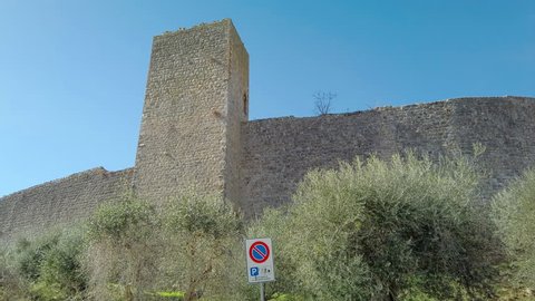 Siena, Italy: Panning gimbal panorama of medieval village of Monteriggioni within the defensive walls in Tuscany; architecturally significant, referenced in Dante Alighieri's Divine Comedy