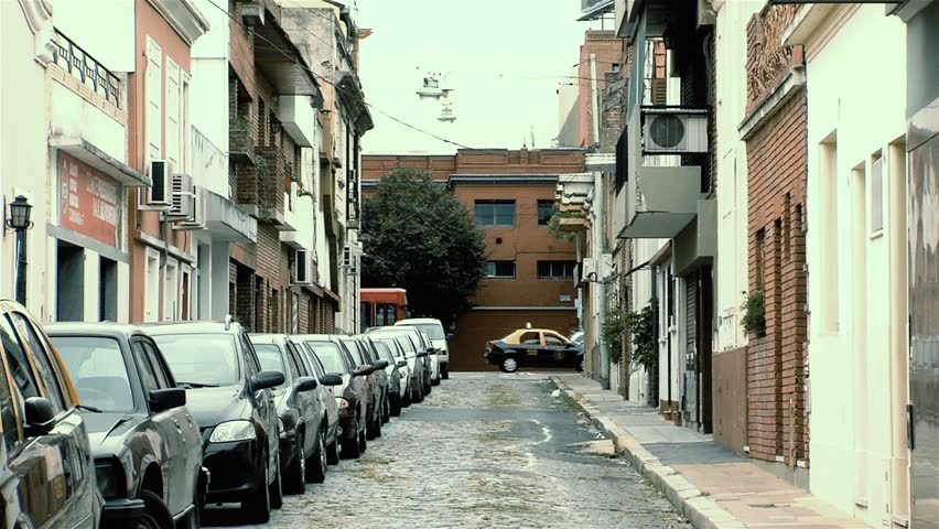 Cars Parked on Narrow Street in San Telmo District, Buenos Aires, Argentina. 