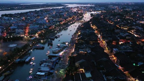 Top view of Hoi An old town or Hoian ancient town in night. Top view of Hoai river and boat traffic Hoi An. Hoi An street and river in night with light.