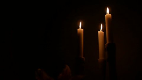 3 candles in the dark