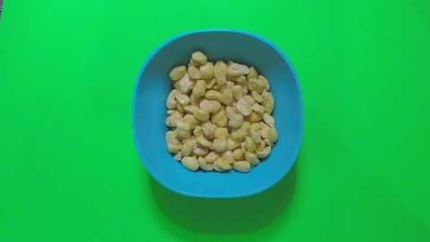 Green screen cereal bowl filled with milk