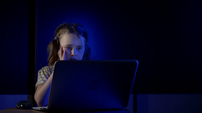 Online a dependent child is sitting watching the social networking the night before a personal computer