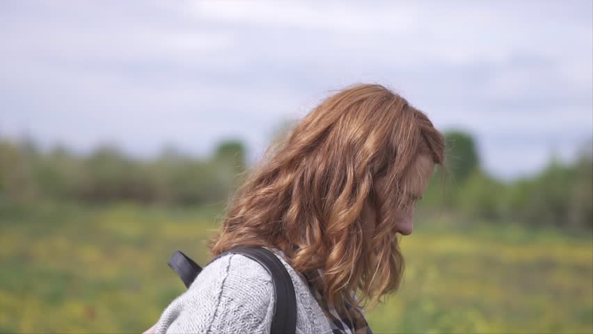 Woman walking, Enjoying Spring in the fields Real People, slow motion video
