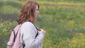 Woman walking in nature, Enjoying Spring in the fields Real People, slow motion video