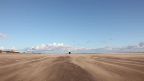 Beach with wind and sand