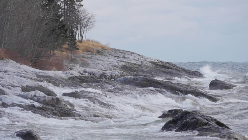 Slow motion waves on rocky shoreline