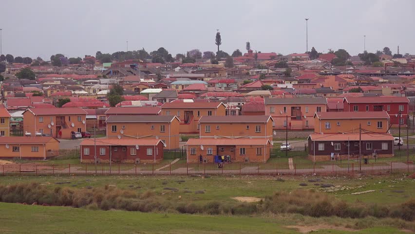 SOWETO, SOUTH AFRICA - CIRCA 2018 - Establishing shot of homes in Soweto Township, South Africa.