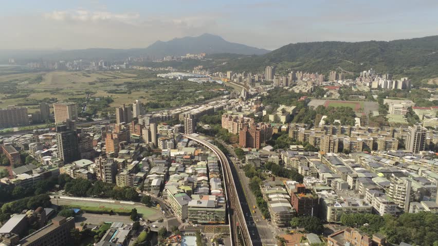 Aerial view of the metro line and cityscape of Xinbeitou area at Taipei, Taiwan
