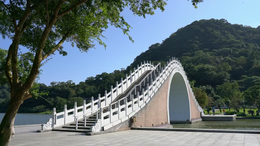 Afternoon view of the Moon Bridge in Dahu Park at Taipei, Taiwan Royalty-Free Stock Footage #1027399049