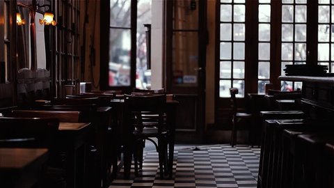 An Empty Traditional Cafe Notable in Buenos Aires, Argentina. Dust Particles Floating in the Air.