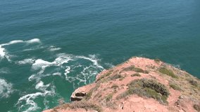 HD high quality summer day footage of Atlantic Ocean views from spectacular scenic Chapman's Peak Drive, rocky mountains between Hout Bay and Noordhoek in Western Cape near Cape Town, South Africa