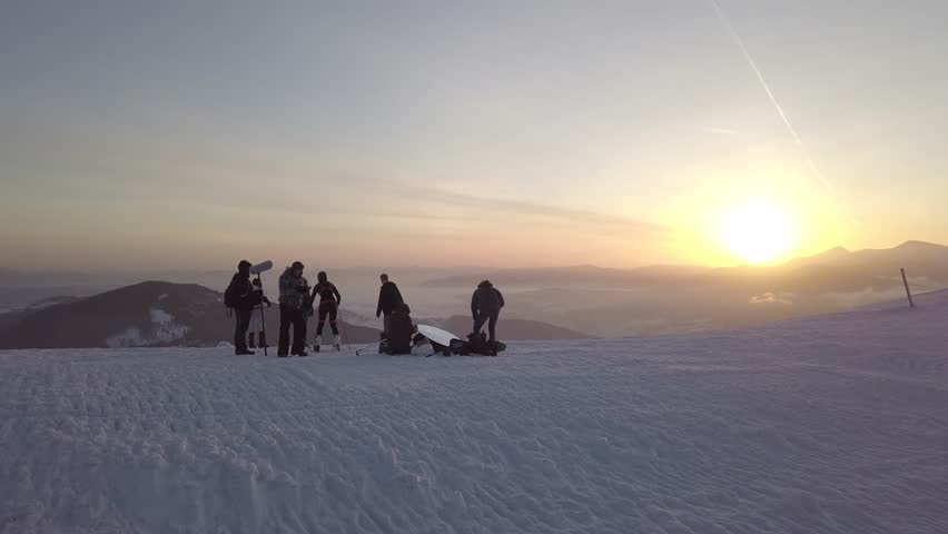 people and dawn in the mountains